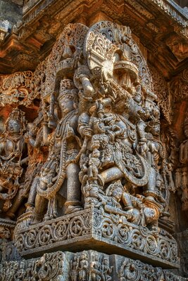 Twin sculptures at the corner - on the right is the Varaha (bore) incarnation of Vishnu - 77